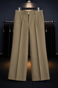 Beige wide-leg pants on a hanger against a dark background